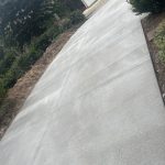 Our Work includes the construction and maintenance of a concrete driveway in a residential area.