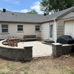 Our work includes creating beautifully designed backyard spaces, complete with a patio and grill for outdoor entertaining.
